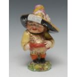 A Derby Mansion House dwarf, standing, wearing a broad brimmed hat, floral fancy shirt, orange sash,