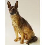 A Royal Doulton model of a seated German Shepherd HN921,