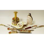 Royal Crown Derby - an 1128 gold band bell; a paperweight penguin (1st); 1128 and 2451 knives;