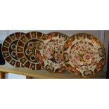 A pair of Royal Crown Derby 1128 pattern plates, 27cm diameter, second quality; another pair,