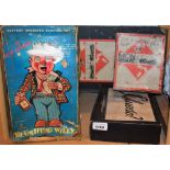 Toys and Juvenalia - a Japanese Yone Toys tin plate battery operated Blushing Willy Bar Tender toy,