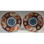 A pair of Japanese Imari fluted plates,