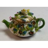 An English porcelain miniature teapot, possibly Coalbrookdale,