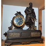A 19th century French belge noir and spelter mantel timepiece,