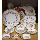 A Royal Crown Derby Royal Antoinette pattern wavy edge plate; a similar quatrefoil dish;