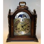 A Hermle mahogany veneered brass mounted reproduction bracket clock,