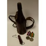 Militaria - WWII medals; a leather cased bottle flask;