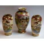 A pair of Japanese Satsuma vases, decorated with river and bridge landscape,