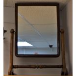A Victorian mahogany dressing mirror, rectangular plate, turned stretcher,