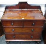 A Victorian wash stand, shaped gallery, two short drawers over two long,