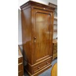 A mahogany hall robe, ogee cornice, panel door, plinth base.