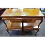 A reproduction mahogany coffee table, book veneered walnut top, crossbanded with kingwood,