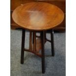 An Edwardian inlaid occasional table with undertier