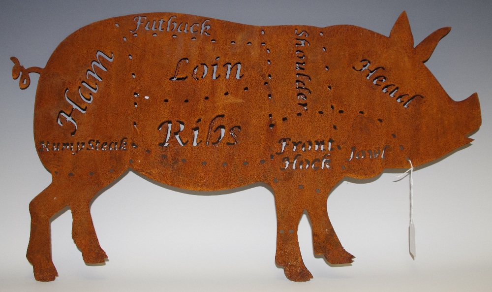 A farmhouse kitchen sign of a pig,