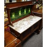 An Edwardian tile back marble topped wash stand