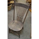 A shaker style spindle back elm dining chair