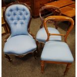 A Victorian spoon back mahogany nursing chair, button upholstered back, serpentine stuffed overseat,