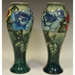 A pair of Moorcroft limited edition inverted baluster vases,