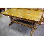 A mid-20th century Old Charm oak dining table,