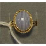 A 9ct gold grey blue banded agate cabochon dress ring, Birmingham 1976, 3.