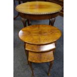 A reproduction oval occasional table, gadrooned border, carved knees, tapering legs,