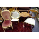 A Victorian balloon back rocking chair; a two dining chairs; an occasional table;