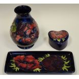 Moorcroft Pottery - an Anemone pattern baluster vase;