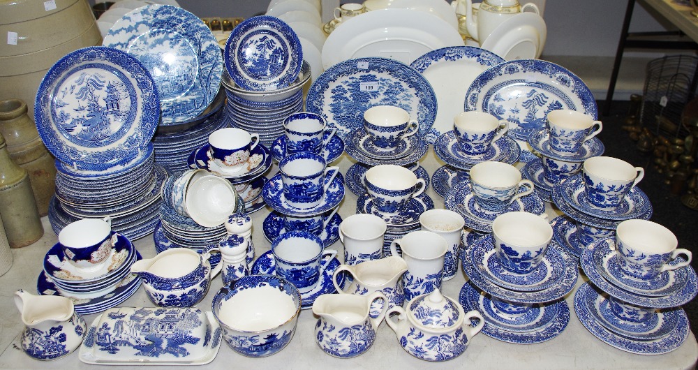 A quantity of blue & white dinner and tea ware including Burleigh Ware and Myott, dinner plates,