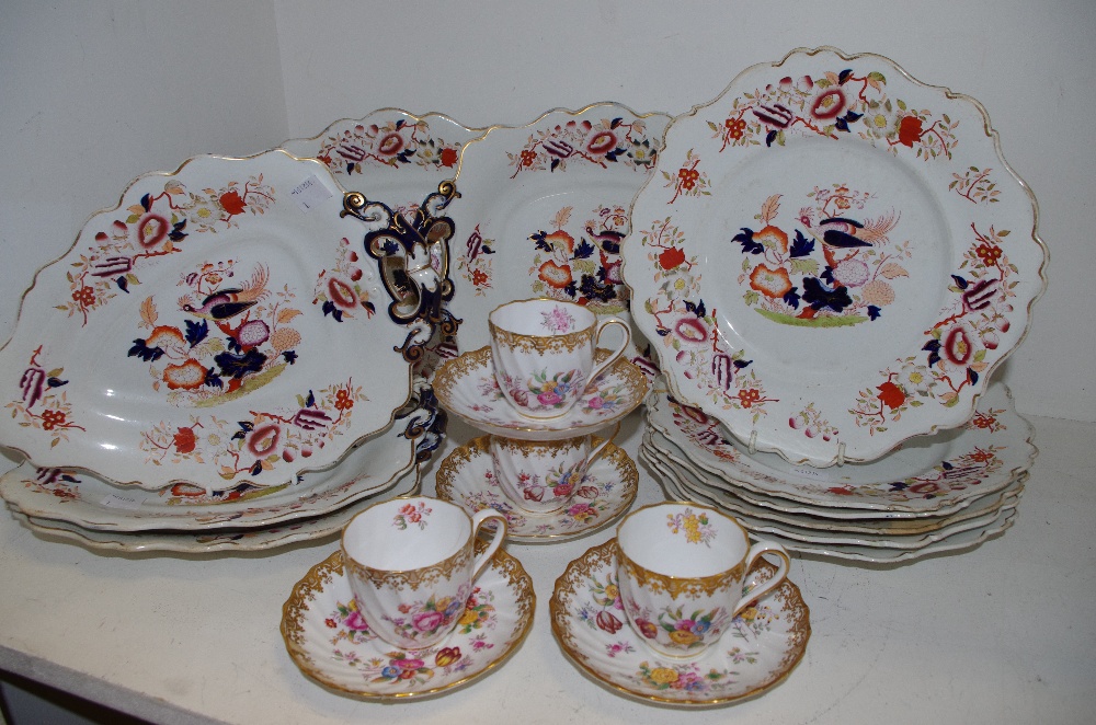 Six 19th century Opaque Granite China wavy edged plates decorated with a fanciful bird and flowers;