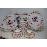 Six 19th century Opaque Granite China wavy edged plates decorated with a fanciful bird and flowers;