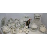 A Royal Doulton Sutherland pattern table setting comprising of coffee pot, six soup cups, teapot,