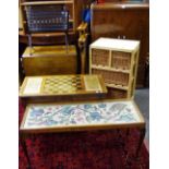 A modern pine and four wicker basket storage unit; a games table/coffee table;