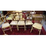 An ash and elm spindle back chair, saddle seat,