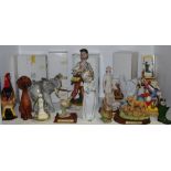 Decorative ceramics - a Capodimonte figure of a man feeding a parrot;