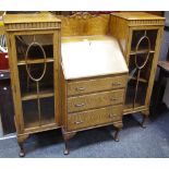 An early-20th century oak side by side bureau,