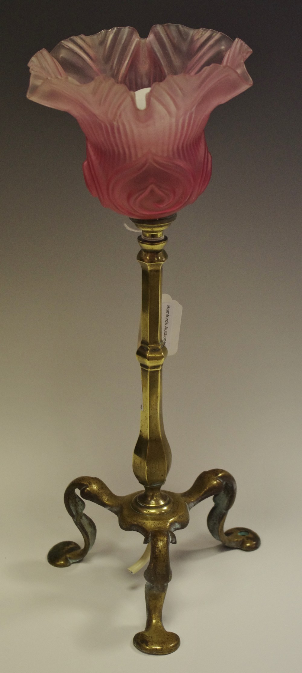 A Pullman brass table lamp fluted pink shade,