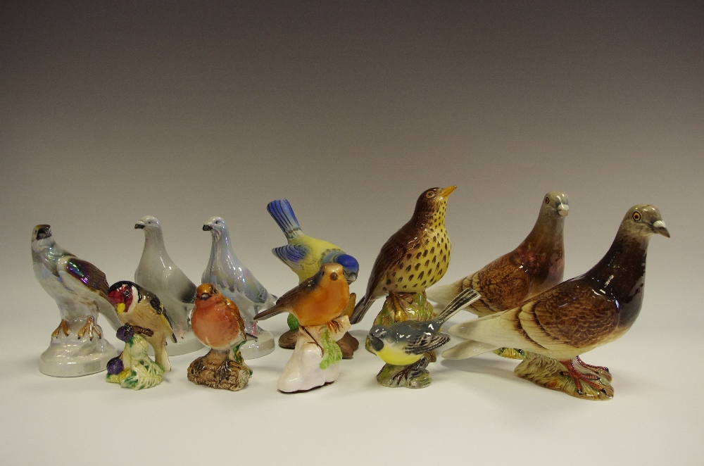 A Beswick Pigeon impressed marks 1383; another (AF); a Beswick Song Thrush impressed marks 2308;