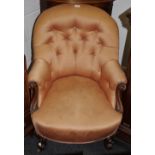 A Victorian mahogany button back nursing chair.