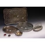 A silver plated galleried tray, scrolling decoration, vacant cartouche,