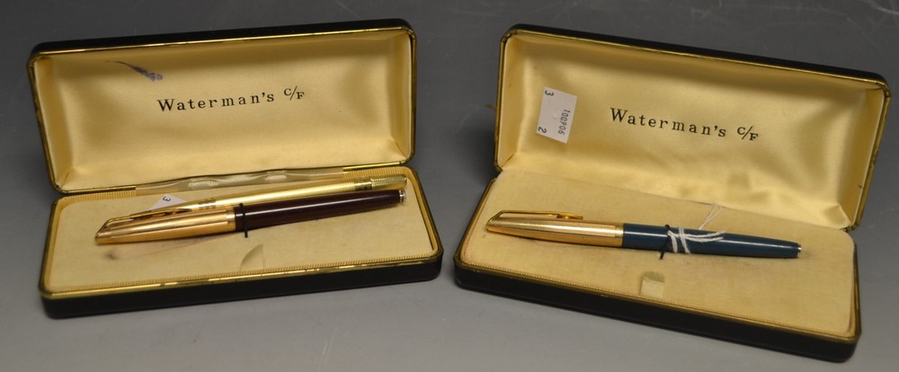 A Waterman pen with 14ct nib; another;