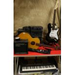 Musical Instruments - a C-Giant electric guitar and amplifier; an acoustic guitar; a Casio keyboard,