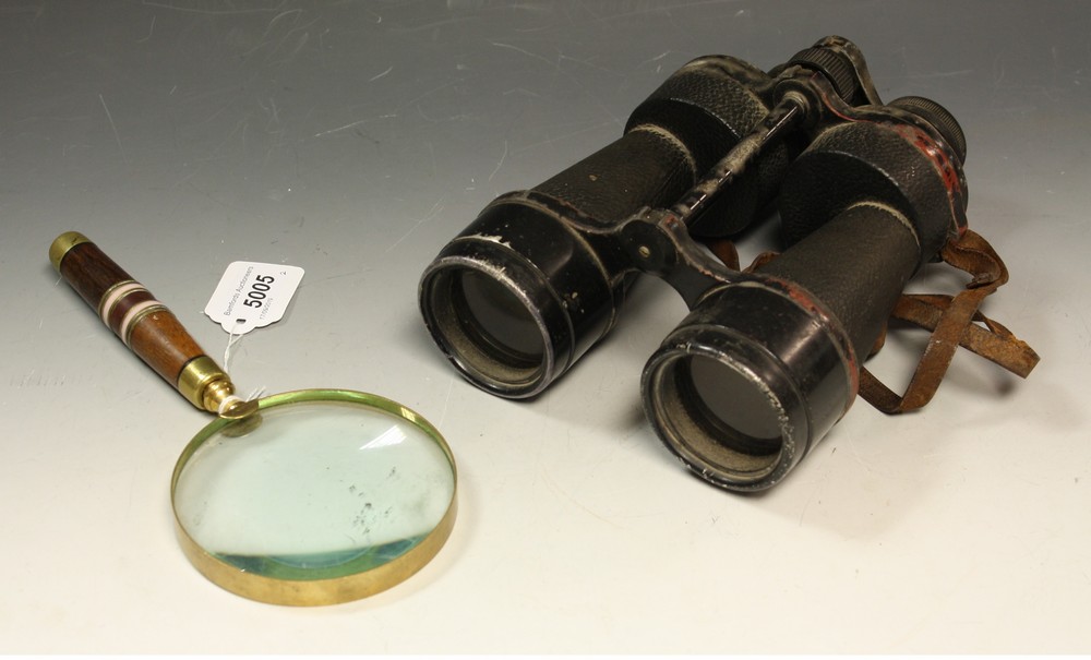 A pair of Ross 7 x 50 Steplux binoculars;