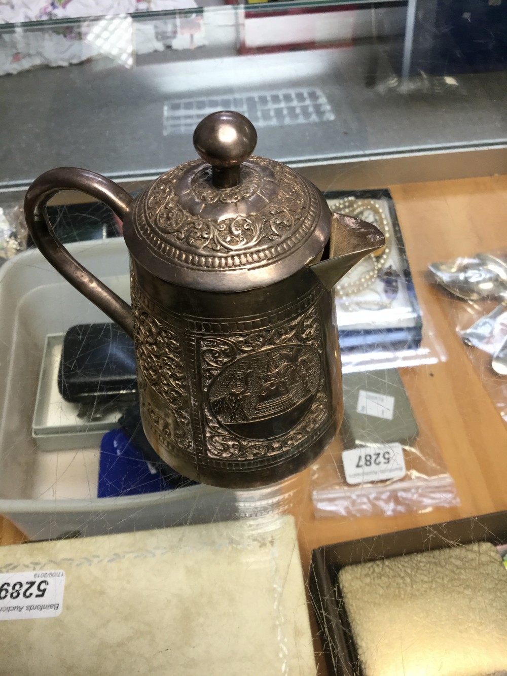 An Indian silver coloured metal three piece tea service on tray, comprising teapot, - Image 6 of 7