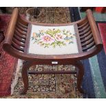 An Edwardian mahogany X-frame stool, 60.