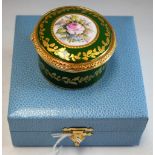 A Lynton porcelain circular table box, painted by Stefan Nowacki, signed,