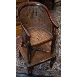 A Victorian child's bergère high chair on stand,