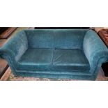 A contemporary Chesterfield shaped scroll arm sofa,