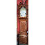 A George III oak and mahogany longcase clock, 33cm arched painted dial,
