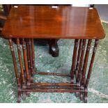 An early 20th century mahogany quartetto nesting table, rounded rectangular tops,