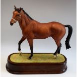 A Royal Worcester limited edition model, Nijinsky, designed by Doris Lindner, No 87, wooden base,